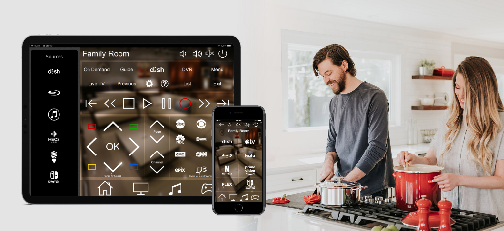 Tablet and smartphone featuring ProPanel app in foreground and man and woman cooking in kitchen in background