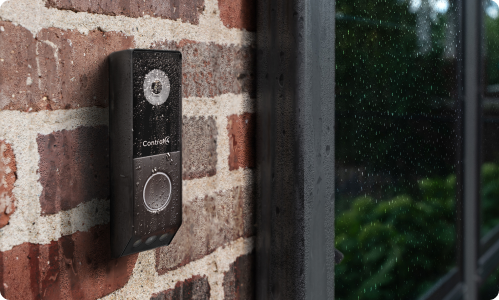 Installed shot of the Control4 Chime Pro in rainy environment
