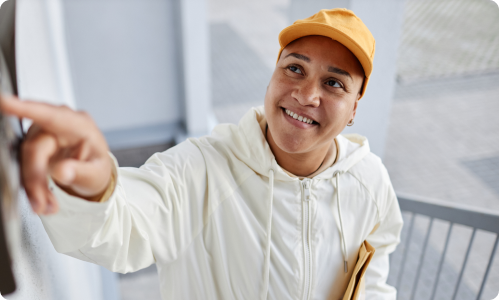 Delivery person approaching with package