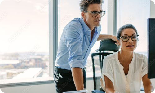 Team members collaborating at a desk
