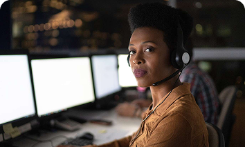 Woman in a dark call center