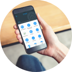 Person holding a cellphone with the OvrC App opened
