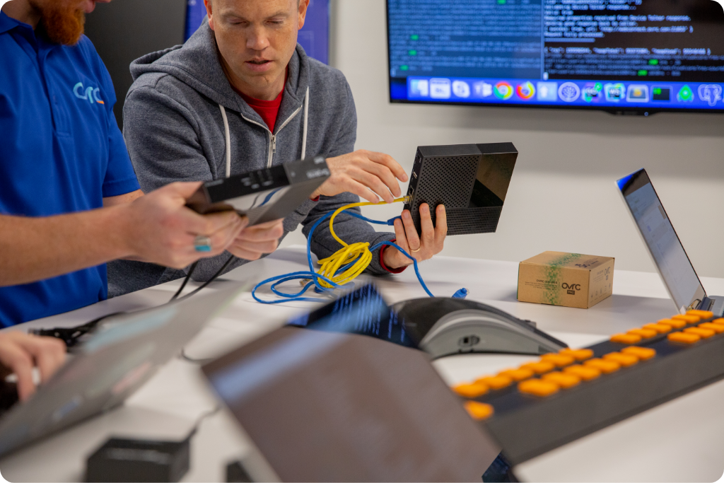 Team of engineers brainstorming over a product