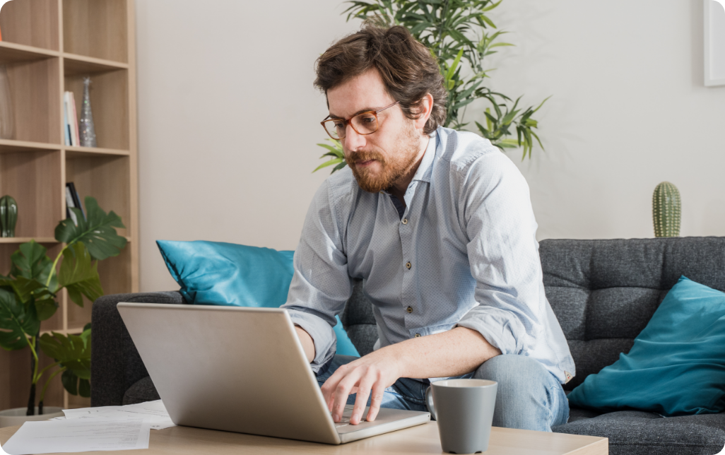 Man doing owrk on a laptop