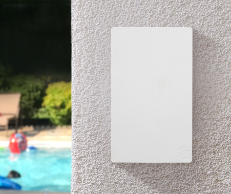 Araknis on wall outdoor WAP installed on a wall beside a pool