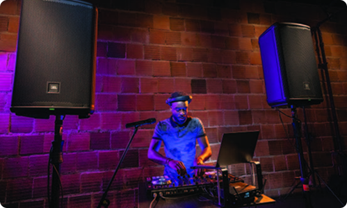 Music DJ with 2 JBL speakers