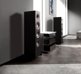 Kef black speakers in a room