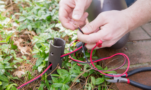 Wiring being installed in outdoor speaker