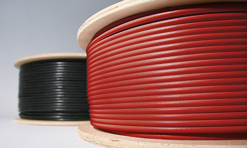 Red and black spools of Wirepath Security Wire