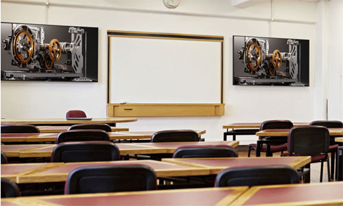 Image of white board and desks in a lectutre />
		</div>
		<div class=