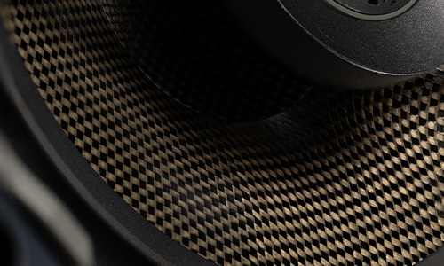 Upclose image of the carbon fiber mesh of the Triad PDX speaker