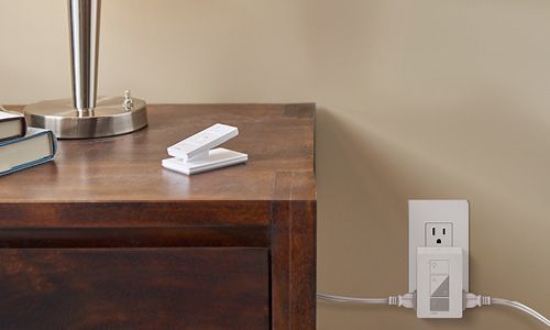 Table with dimmer plugged into outlet